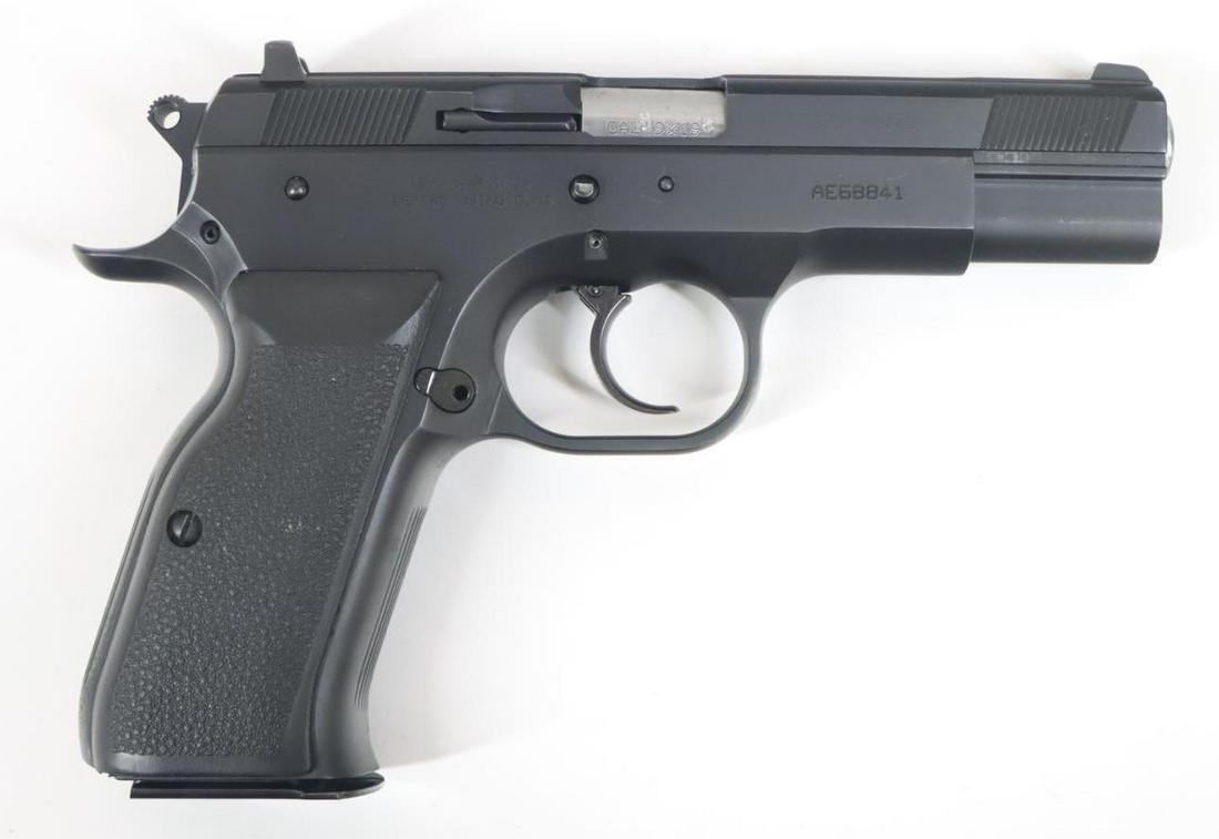 European American Arms/Fratelli Tanfoglio Witness Semi Automatic Pistol: 9mm, 4 3/8" bbl, SN AE68841. 98% matte black finish shows light/average handling with a few small scuff and scratches, good bore, textured rubber Tanfoglio marked grips show light handling, 1-15 rnd m