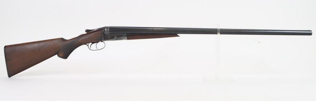 A H Fox Sterlingworth SxS Shotgun: 12Ga. 30" bbls, 2 3/4" chambers, Full/Mod chokes, SN 92310. Dark gray/silver patina, good bores, solid rib, border engraved receiver, extractors, checkered wood stock and forearm show average handling