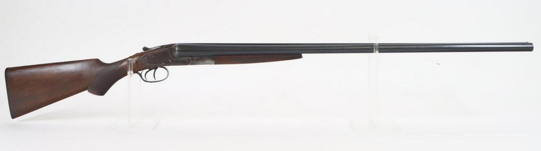 LC Smith Field Grade SxS Shotgun: 12Ga. 32" bbls, 2 3/4" chambers, Full/Mod chokes, SN 52042. 90% blue finish on barrels with scattered areas of light freckles and thinning on most edges, good bores, solid rib, receiver shows brown/si