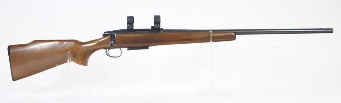 Remington Model 788 Bolt Action Rifle: 22-250 Rem, 23 3/4" bbl, SN 6028970. 95% blue finish shows thinning on crisp edges and carry points, good bore, factory sights are included but not installed, Weaver scope rings and bases, wood stock 