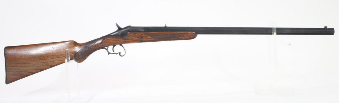 Belgian Parlor Rifle Single Shot Rifle: .30? center fire .288 bore, 24 1/2" bbl, SN 407. 85% blue/brown finish shows a light frost texture and average handling, octagon barrel with gold fill scrolling on top of breech, raising block action 