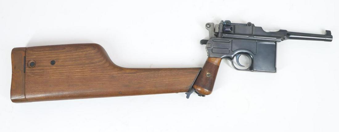Waffenfabrik Mauser C96 Semi Automatic Pistol With Shoulder Stock/Holster: 7.63x25 Mauser, 4" bbl, SN 441636. 98% older reblue finish shows light handling with thinning on crisp edges and a few scattered nicks, good bore, all visible numbers match, incorrect steel lanyard ri