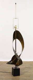 Harry Balmer for Laurel Ribbon Lamp: Bronze tone steel ribbon on painted aluminum base, unmarked. In working condition. 56"h x 13"w **Please Note: This item is NOT eligible for in-house shipping. Please refer to the terms and conditions