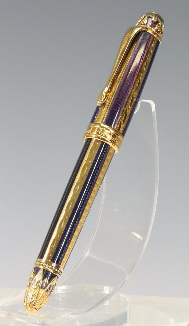 S.T. Dupont Fountain Pen, 18k Nib: S.T. Dupont Fountain Pen, gilt and blue enamel ribbed, 18k M Nib.