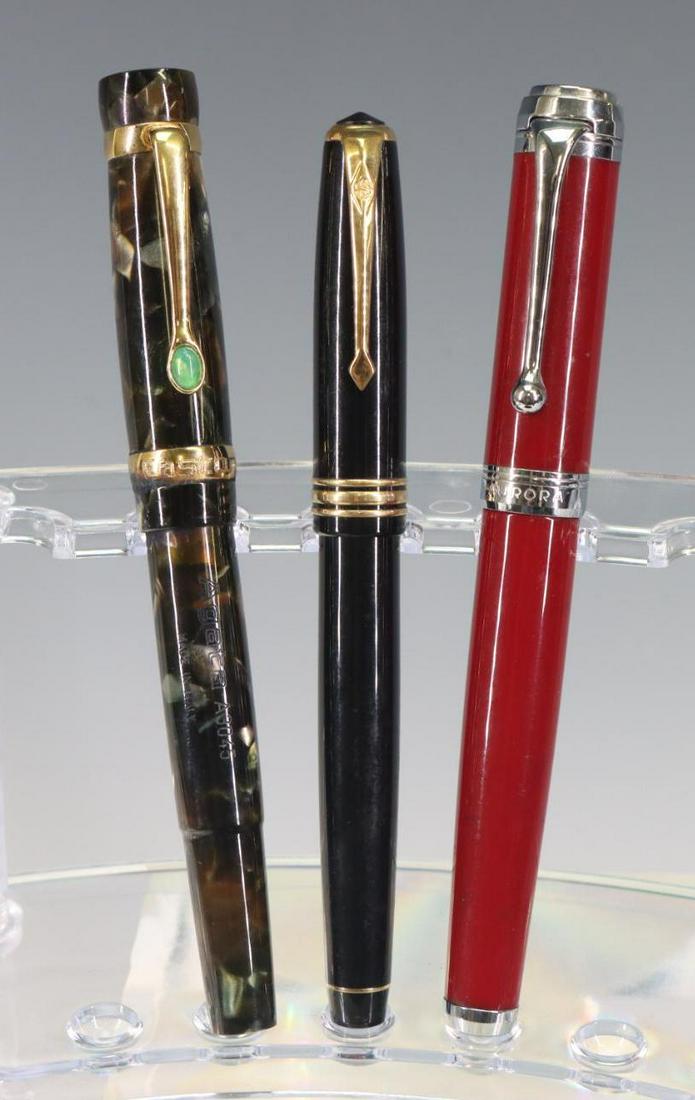 Aurora, Namiki & Stipula Castoni Fountain Pens, 14k Nibs: Aurora Fountain Pem, red, 14k Nib. Stipula Castoni Fountain Pen, Agata, marbles design with stone on clip, 14k Nib. Namiki Fountain Pen, black.