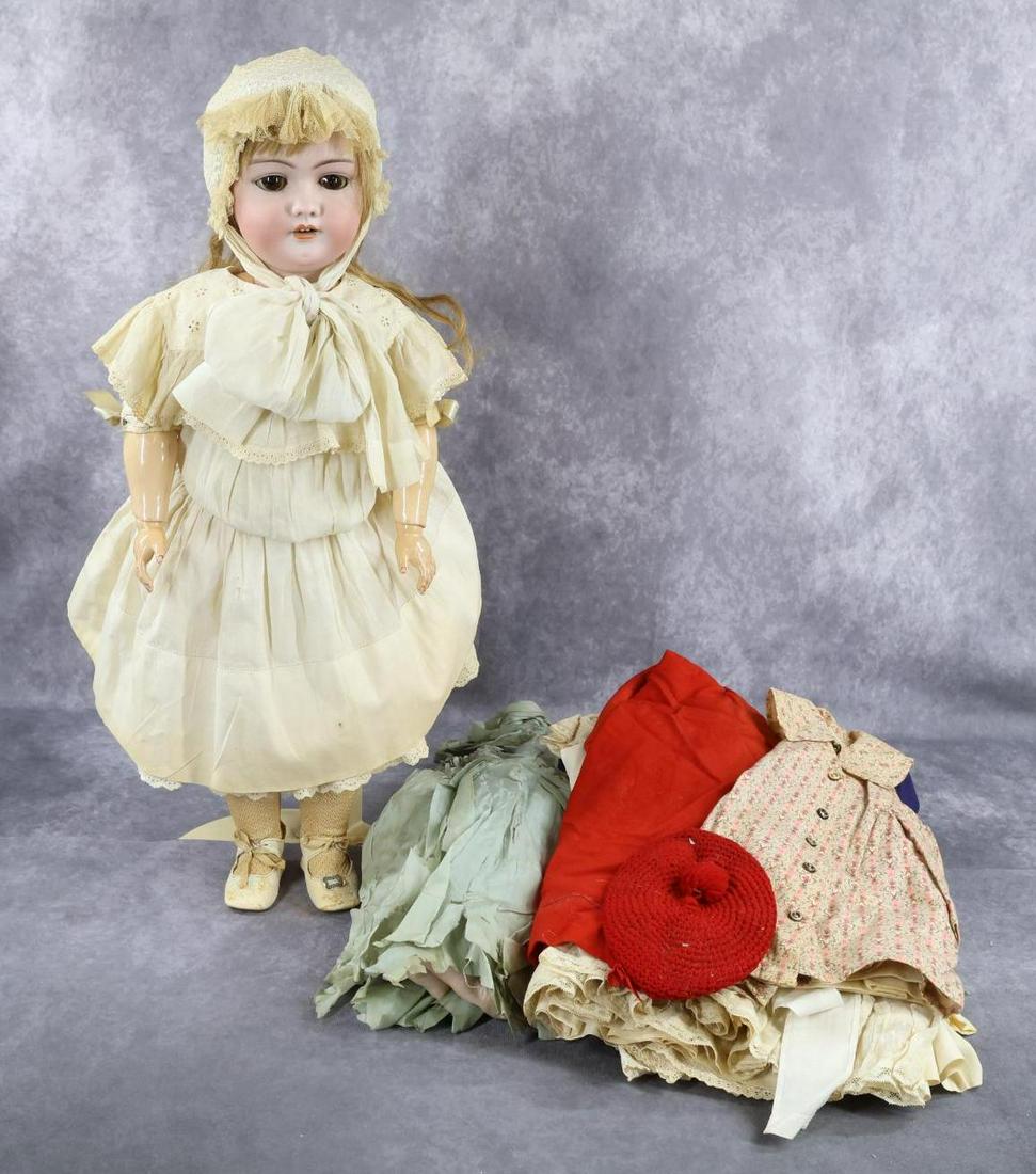 ANTIQUE GERMAN BISQUE DOLL(S).: LOT. This is an original family owned doll. 25" S & H 1079 DEP GERMANY 13 doll with brown sleep eyes, open mouth, pierced ears, long honey blonde human hair wig. Prominent dimple in chin. Papier mache
