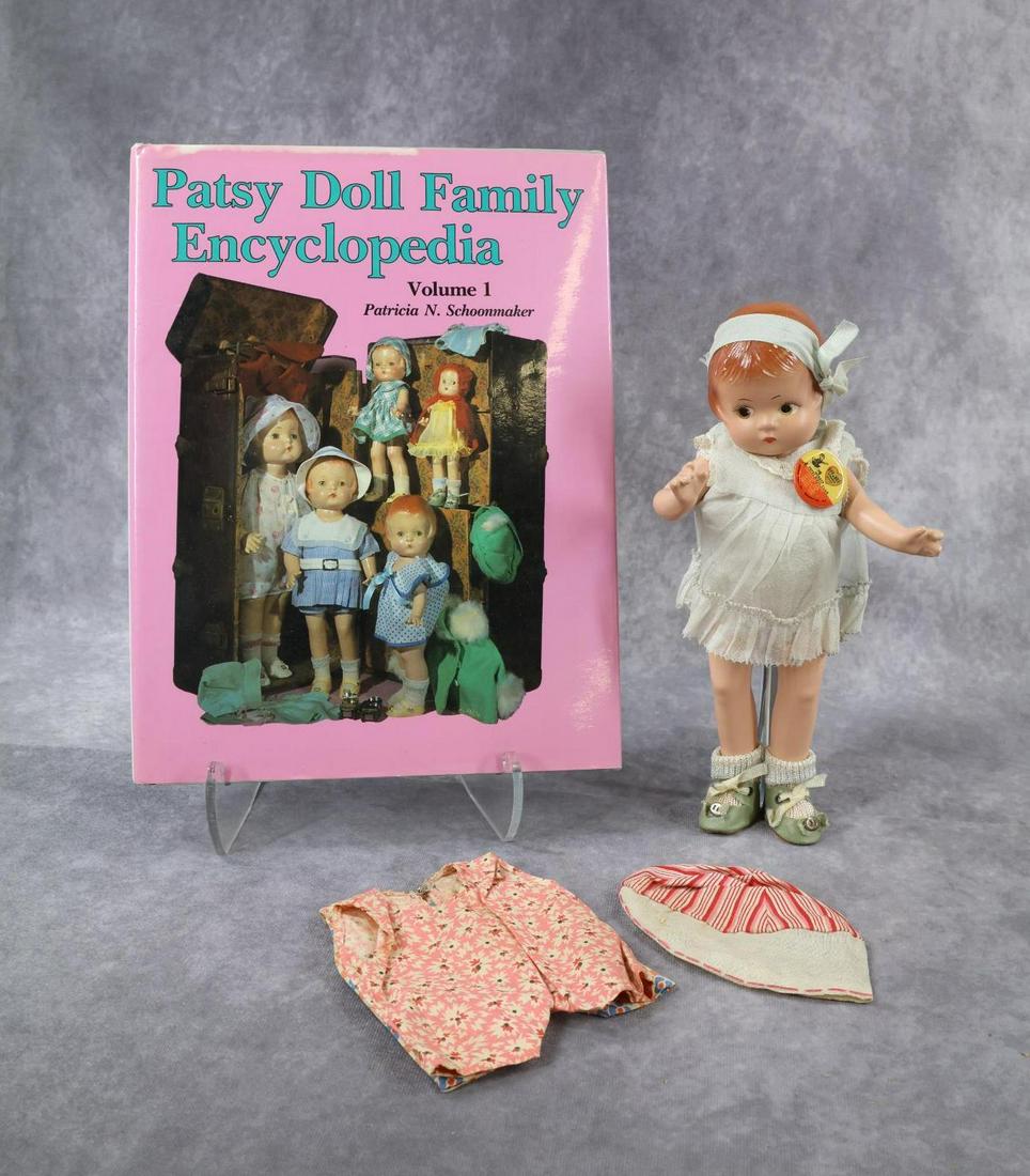 COMPOSITION DOLL(S).: LOT. 9" All original EFFANBEE "Patsyette" doll with painted brown side glance eyes, red hair. 3 Pc. pale blue organdy outfit with original EFFanBEE Member Patsy Doll club pin. Pale blue oilcloth shoes