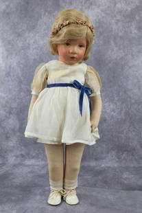 KATHE KRUSE.: 20" (German Child) Doll VIII with large thin body. (Around 1930) "Ilsebill". Swivel neck. Painted features with blonde human hair wig. Legs with disc joints, separately stitched arms. Dressed in vinta