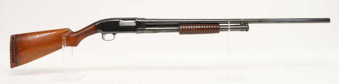 Winchester (Pre 64) Model 12 Pump Action Shotgun: 16Ga. 28" bbl, 2 3/4" chamber, Mod choke, SN 436146. 85% blue finish shows general thinning with areas of moderate freckling, good bore, wood stock and ribbed forearm show average handling with older 
