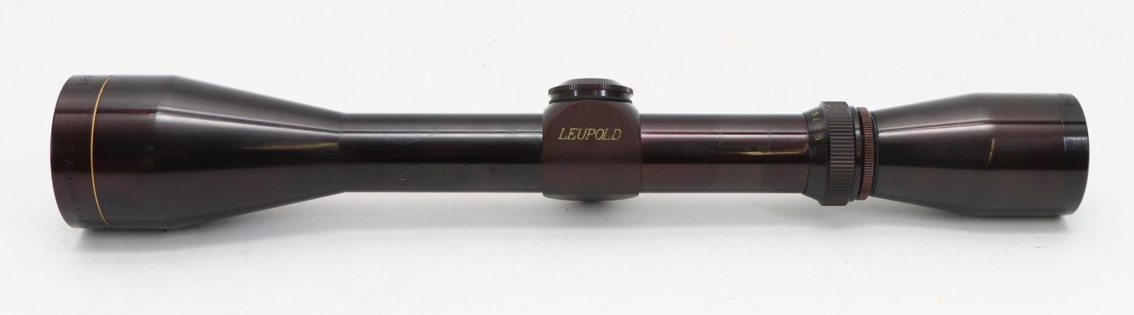 Leupold Rifle Scope: Vari-X II 3-9x with Duo-plex reticle and clear optics, body shows a slight plum color with light handling. Removed from prior lot. Good condition