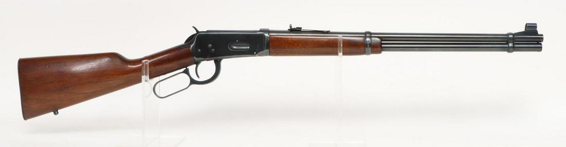 Winchester (Pre 64) Model 94 Lever Action Rifle: 30-30 Win, 20" bbl, SN 2490722. 90% blue finish shows average handling with scratches and abrasion on right side of receiver, good bore, hooded front sight, wood stock and forearm show average handlin