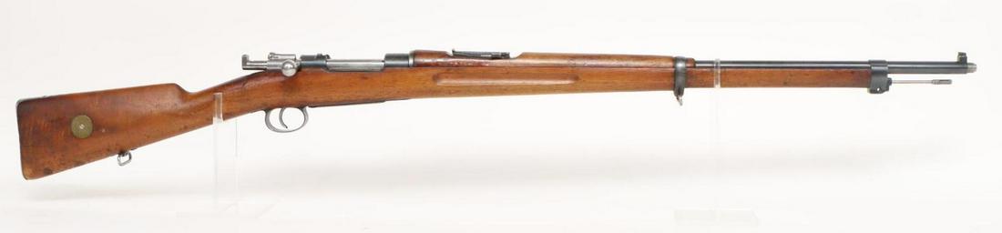 Waffenfabrik Mauser Oberndorf/CAI M96 Bolt Action Rifle: 6.5x55, 29 1/4" bbl, SN 57858. 75% blue finish with moderate freckling, good bore, threaded muzzle with minor damage to threads, flip up rear ladder sight, matching numbers on bolt and receiver, wood 