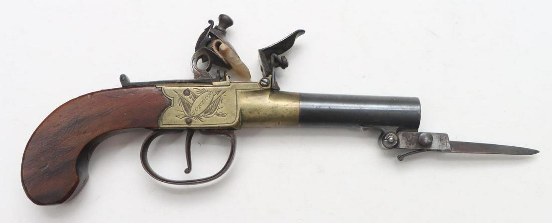 H Nock English Center Hammer Flintlock Screw Barrel Pistol With Snap Bayonet Matches Prior Lot: .41, 2 1/4" bbl, NSN. Dark brown patina on barrel, very good deeply rifled bore, under mounted snap bayonet with 1 3/4" triangular blade and good working mechanism with the trigger guard being pulled 