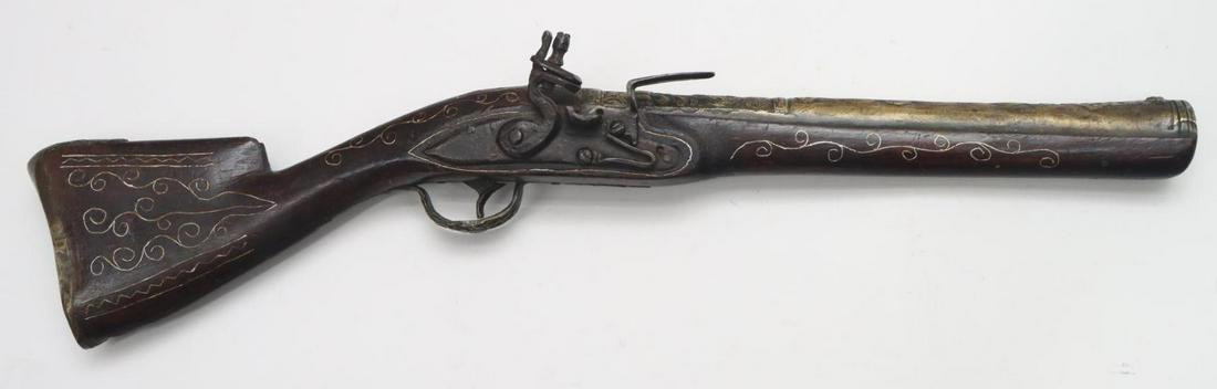 Antique Flintlock Blunderbuss Knee Gun: Approx .50 bore with muzzle flared to 1.18" ID, 11 1/2" bbl, NSN. Aged brass?/alloy barrel with crude mid eastern motif shows poor bore with small 3/4" crack on right side of muzzle, lock holds on hal