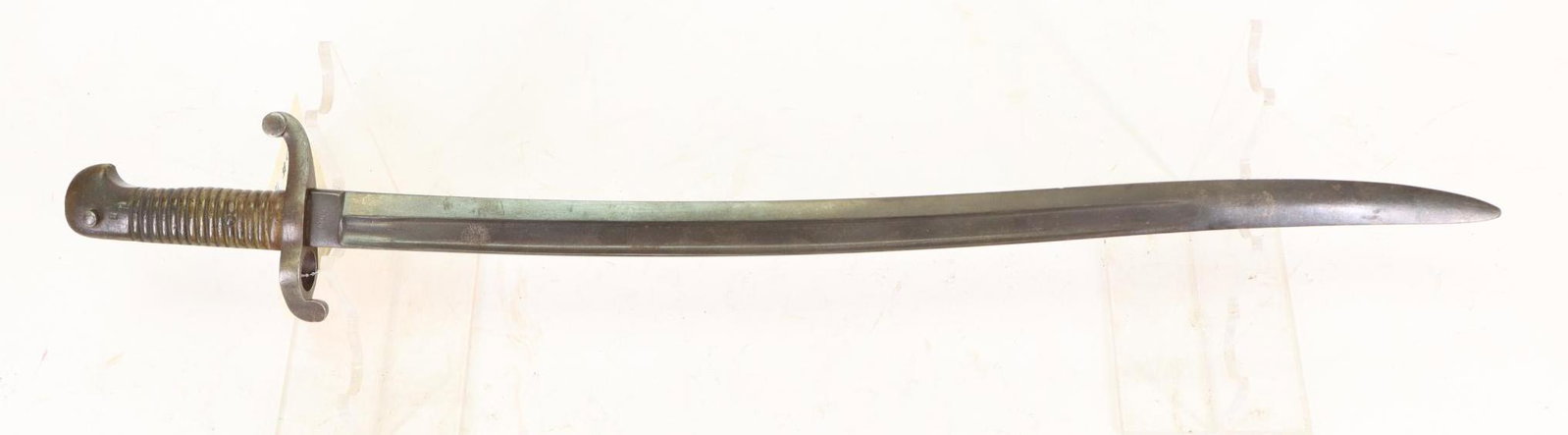 Civil War Saber Bayonet: Civil War French Import Saber Bayonet measuring 27.5" (blade 22.5"). Ricasso marked "P.D.L". Model 1842 presents steel lug and cross guard and brass hilt. Bayonet blade exhibits darkening. Bayonet lac