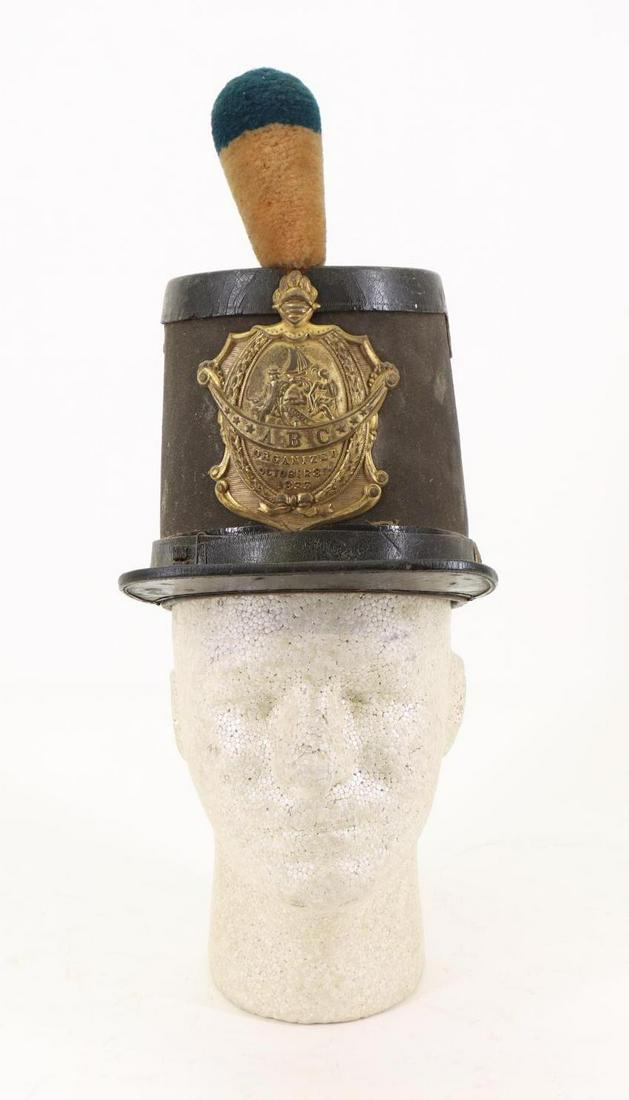 New York (Albany Burgesses Corps) Military Shako: New York (Albany Burgesses Corps) mid nineteenth century military shako featuring front plate designated "ABC, ORGANIZED OCTOBER 8th 1833". Interior of shako exhibits makers label from "JOHN A BAKER, 