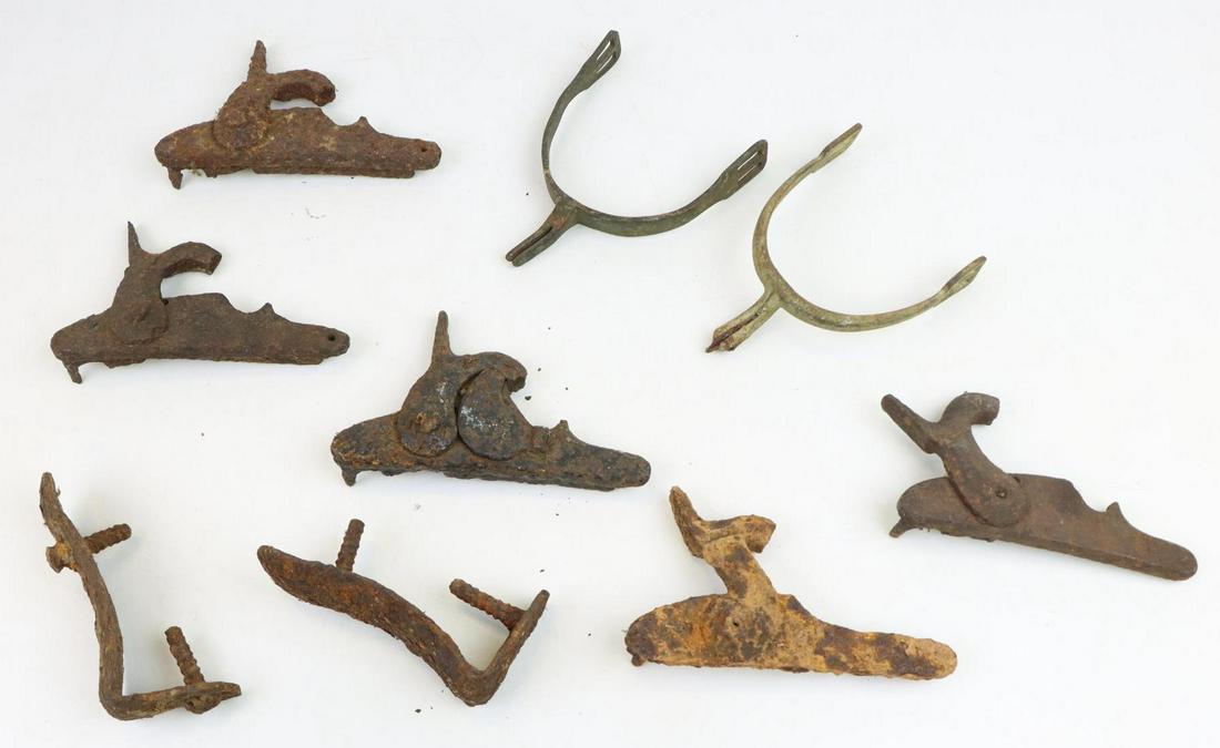 Collection of Excavated Civil War Relics: Collection of excavated Civil War relics including: 1.) Five Springfield musket lock plates with hammers (one presenting Maynard tape primer). 2.) Pair of iron musket butt plates. 3.) Two brass spurs.