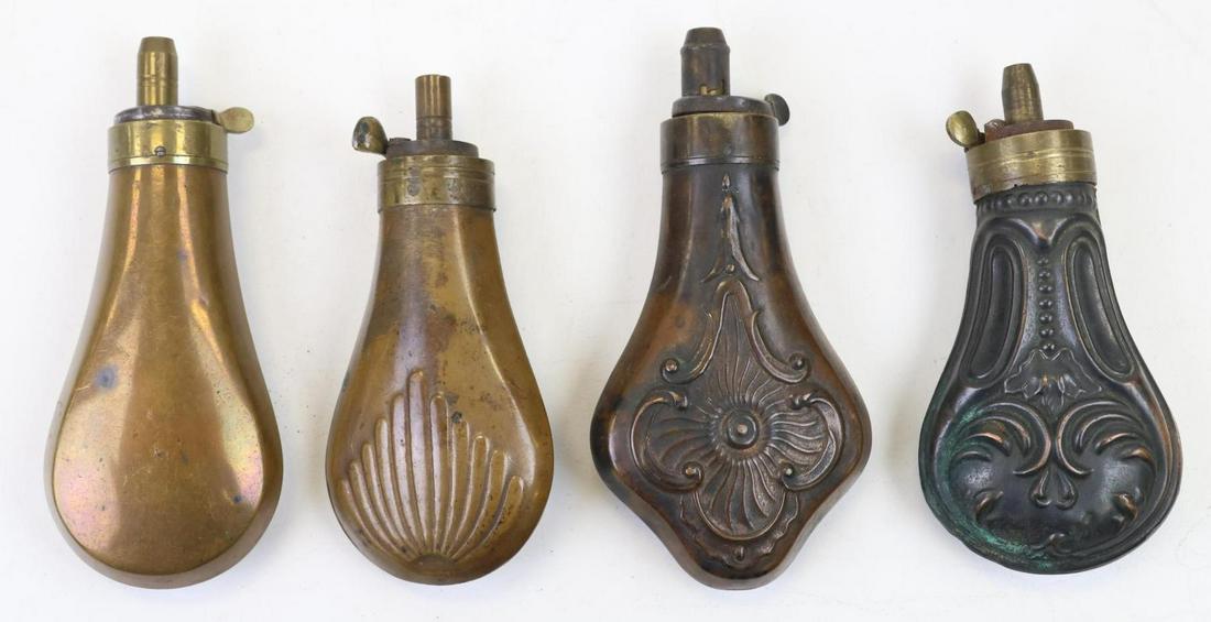 Civil War Period Powder Flasks: Collection of 4-Civil War period powder flasks including: 1.)Smooth powder flask measuring 5" including spout. 2.) Decorated design powder flask measuring 4.5" including spout. 3.) Decorated design po