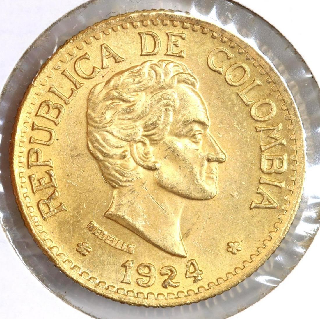 COLOMBIAN GOLD COIN: 5 Pesos, small head, 1924 BU, .2355 ozt gold coin **Please Note: In-house shipping is NOT available for the Coins auction. Please refer to the terms and conditions of this auction for local shippers.