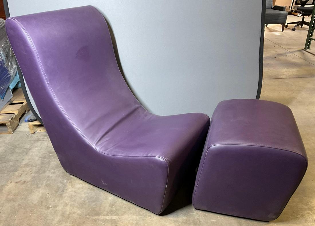 Chair and Ottoman: Purple leather chair 21"w x 35"d x 40"h, 14"h seat and ottoman foot stool 21"w x 18"d x 19.5"h. This lot is not eligible for Alderfer transport. Buyer is responsible for bringing all necessary help an