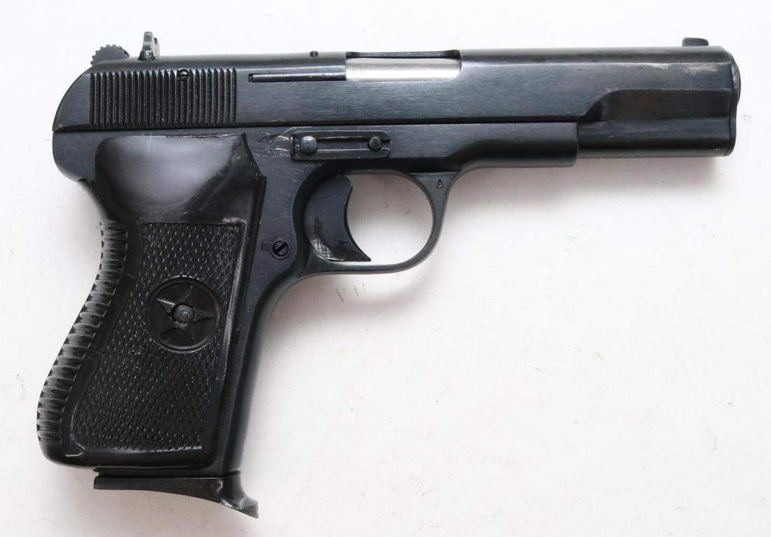 Norinco Model 213 (Chinese Tokarev) Semi Automatic Pistol: 9mm, 4 1/2" bbl, SN 13049373. 95% blue finish shows average handling with areas of loss and touch up on right side and top of muzzle, good bore, checkered plastic grips show average handling, 2-8 rnd