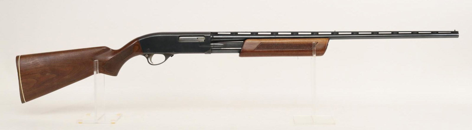 High Standard Flite-King Skeet Model K410 Pump Action Shotgun: .410, 26" bbl, 3" chamber, Skeet choke, NSN. 85% blue finish shows average handling with moderate/heavy freckling on receiver and back half of barrel, good bore, vent rib with center bead, checkered w