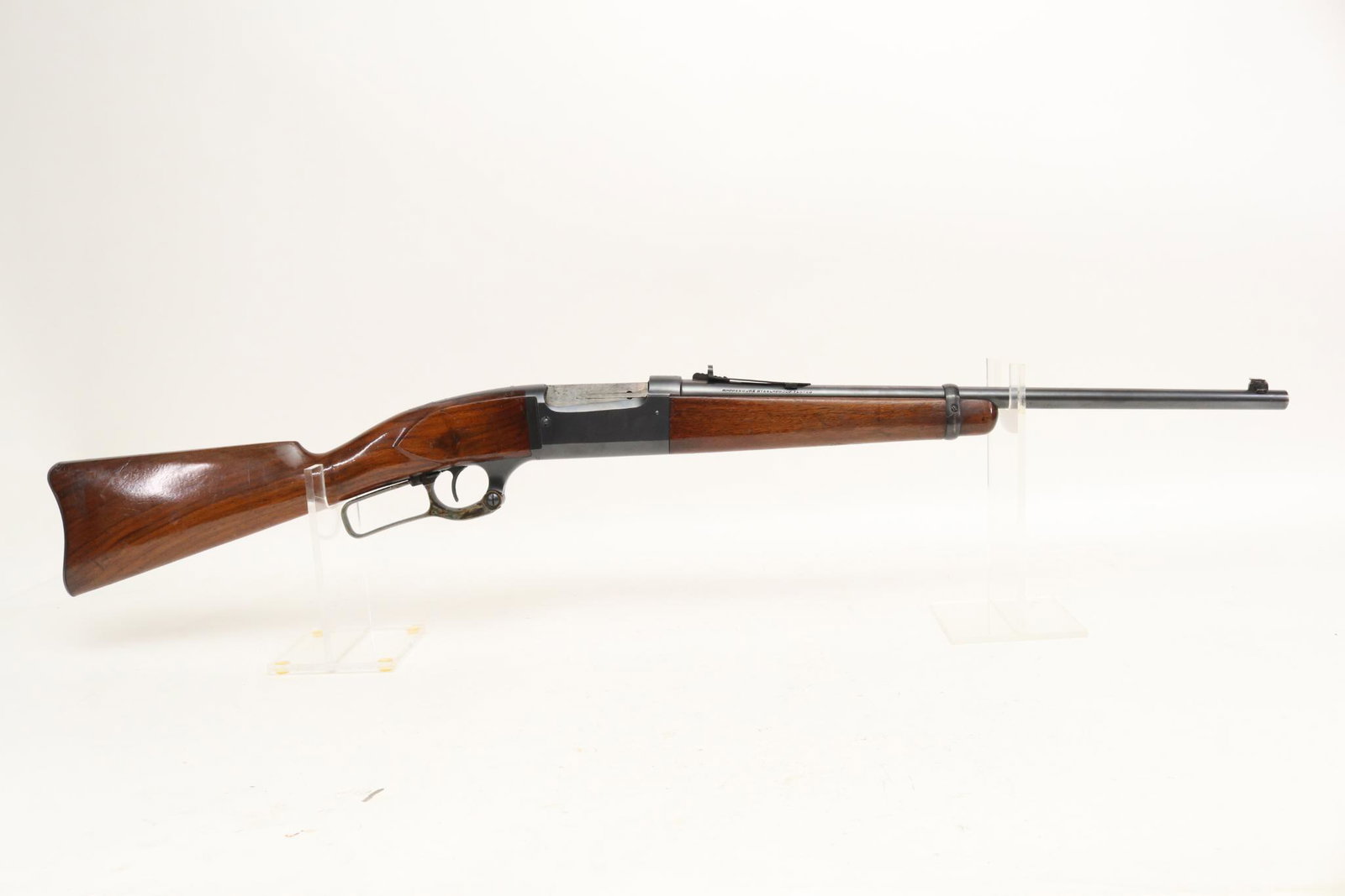 Savage Model 99 Lever Action Rifle: 30-30 Win, 20" bbl, SN 200417. 80% blue finish shows average handling with small area of shallow pitting on bottom of receiver and bottom of barrel just forward of forearm, good bore, lever shows 90% 