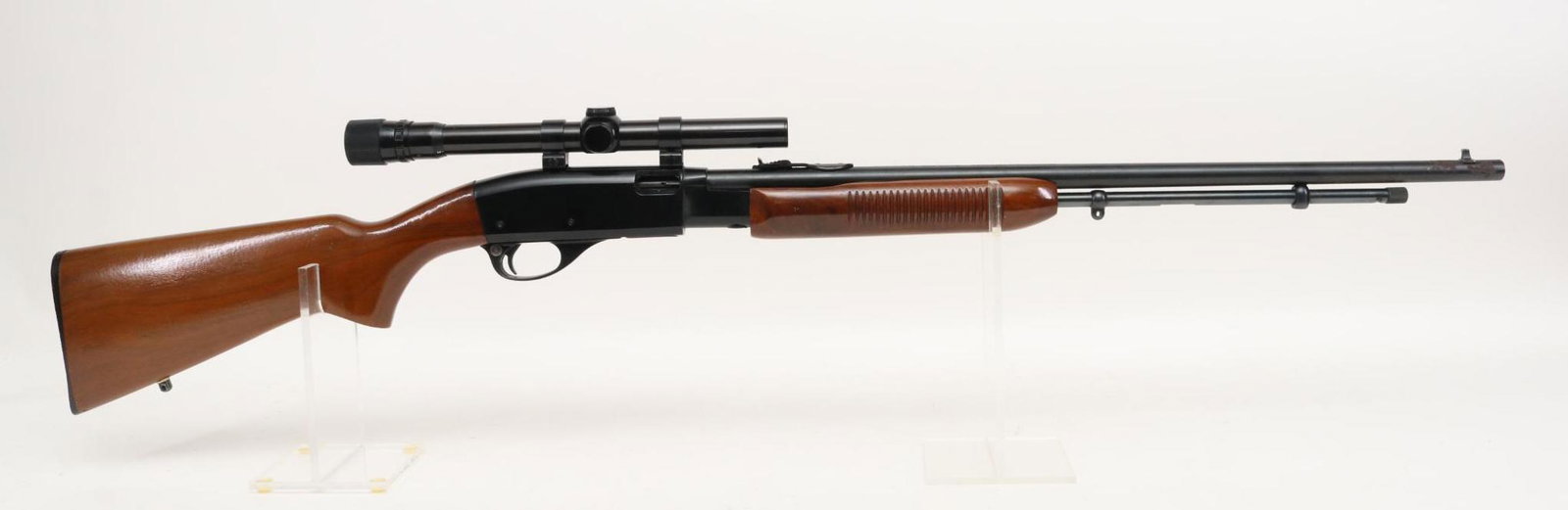 Remington Fieldmaster 572 Pump Action Rifle: 22S,L,LR, 23 1/2" bbl, SN 1464623. 90% blue finish shows average handling with front 3" on outside of barrel from muzzle back having very deep pitting, good bore, Weaver V22A 3-6x rifle scope with Duo