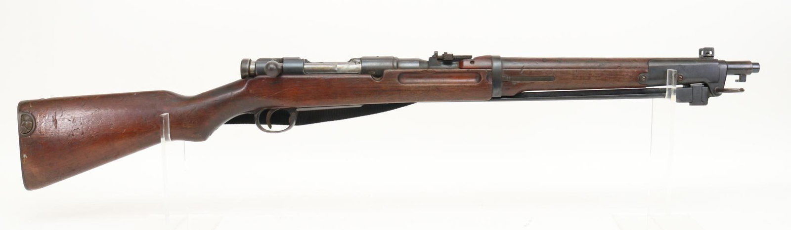Kokura Arsenal Type 44 Arisaka Carbine: 6.5 Jap, 18 1/2" bbl, SN 02975 Series 1. 95% blue finish shows light handling with scattered freckles, good bore, partially ground mum, ladder type rear sight, under folding bayonet with 13" triangula