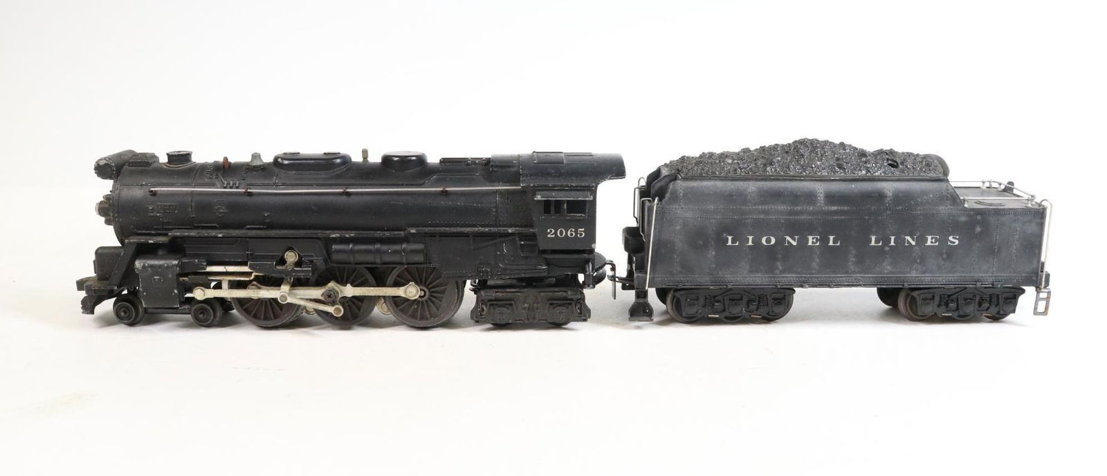 Lionel Steam Engine: O gauge, 3-rail 4-6-4 steam locomotive #2065 and tender #2426W.