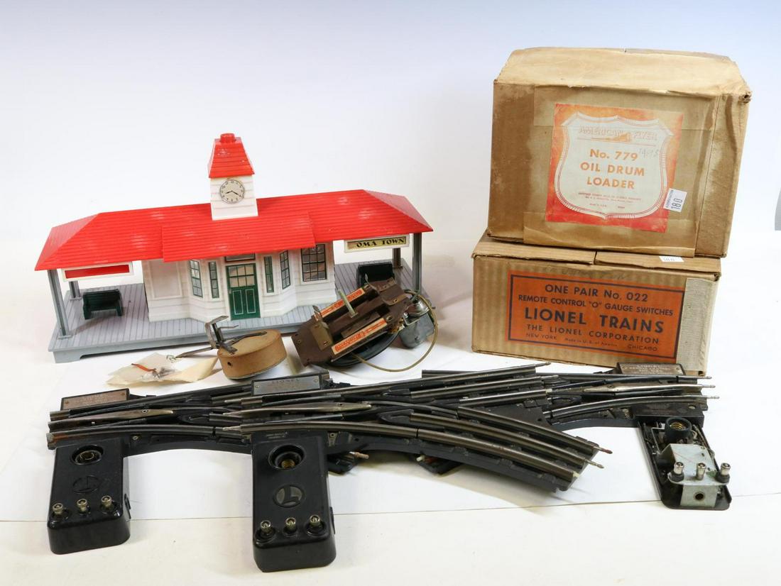 Lionel and Other Accessories: O scale, Lionel #22 switches, Noma Lites train station and American Flyer oil drum #779.