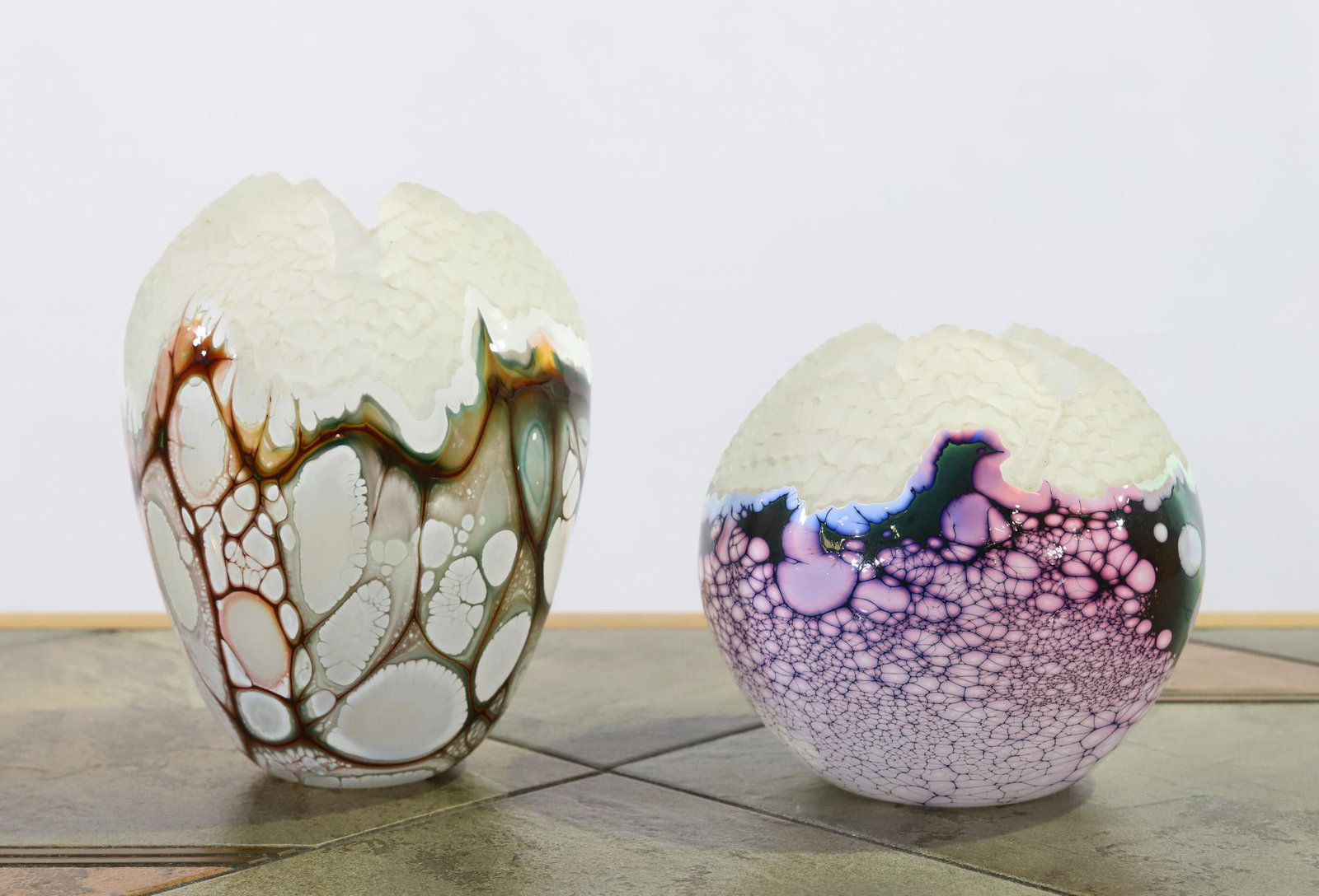 Noel Lane Art Glass Sculptures: Pair of Noel Lane art glass sculptures in her naturalistic geode style. 5.5"h x 5.5"w, and 7.5"h x 5.5"w