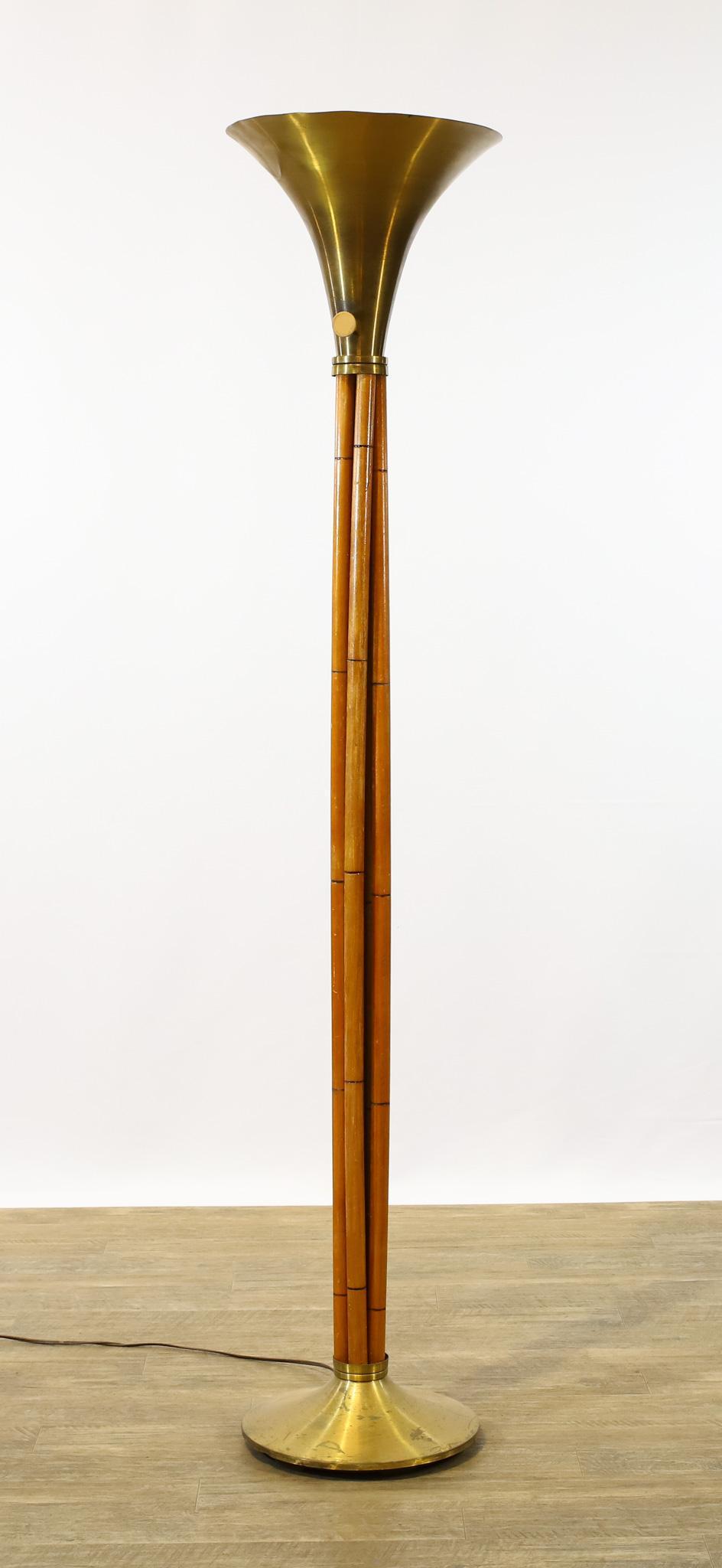 Russel Wright for Mutual Sunset Floor Lamp: Lacquered bamboo and spun brass torchiere floor lamp, marked to the base. Dents and wear/pitting to the brass, replaced switch, and the wire wrapping to the column is not present. In working condition