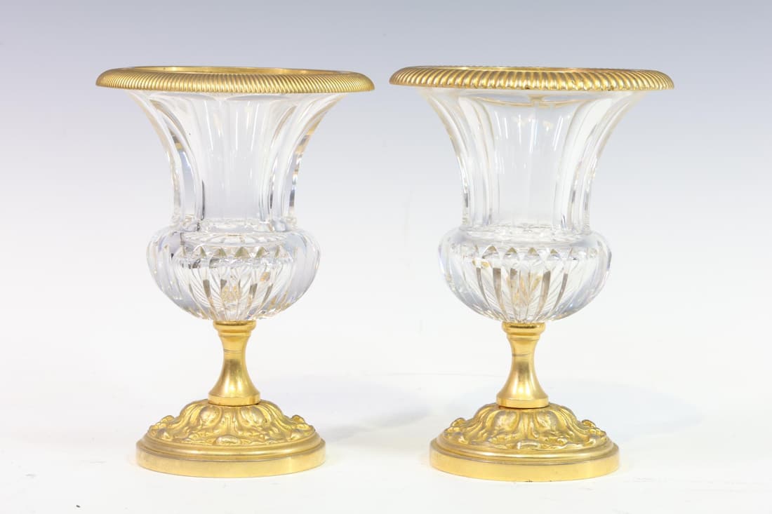 Ormolu and Crystal Vases: French vases with cut crystal bodies, ormolu feet and rims. A complementing pair. 5.75"h x 4.25"w
