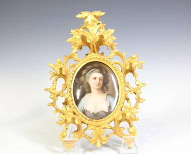 Hutschenreuther Porcelain Plaque in Hand Carved Frame: Hand carved Florentine frame of oak leaves and scrolls surrounding a hand painted portrait of Countess Zofia Potocka after Anton Graff. Impressed shield mark en verso. 5"h x 4"w