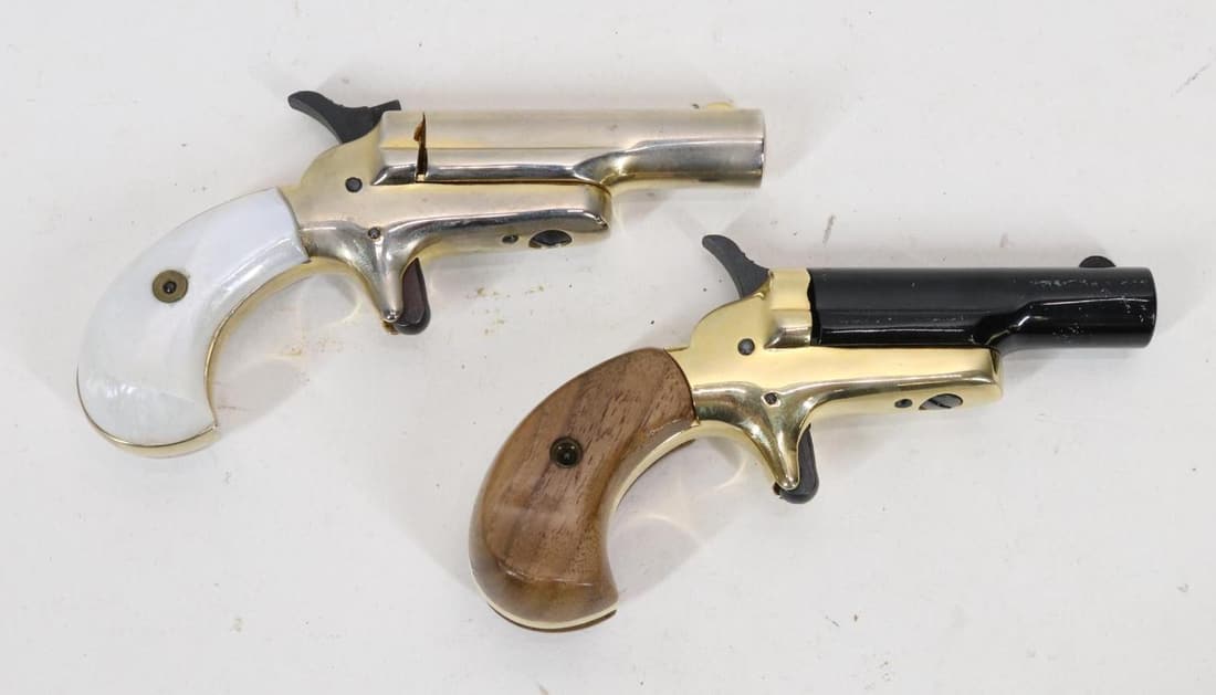 Cased Butler M1872 Lord And Lady Derringer Set: Pistol 1- 22 Short, ,2 1/2" bbl, SN B71369. pale gold tinted plating, good bore, pearl birdshead grips show cracking at center screw on left scale. Good condition 23-0920. Pistol 2- 22 Short, 2 1/2" b