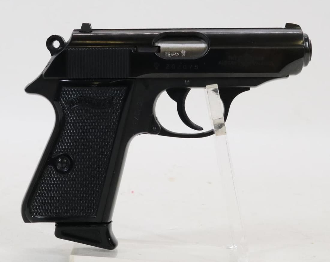 Walther/Interarms PPK/S Semi Automatic Pistol: 9mm Kurz/380 ACP, 3 1/4" bbl, SN 202075. 99% blue finish shows only very light handling, good bore, checkered plastic grips show a few small scratches. Good condition. 23-0954