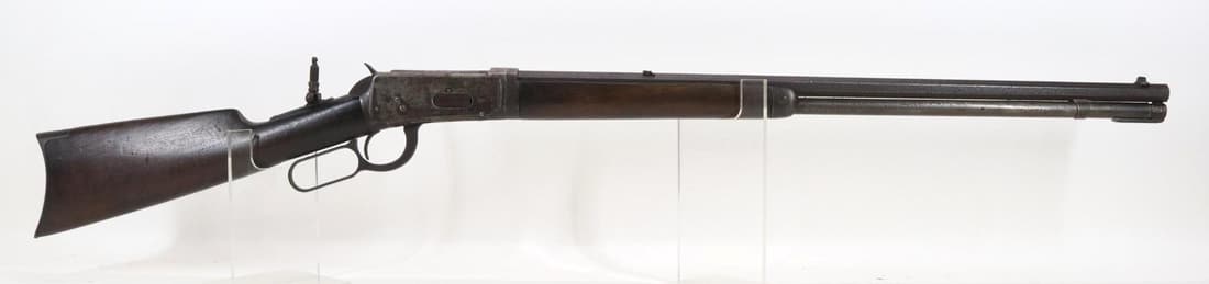 Winchester (Pre 64) Model 1894 Takedown Lever Action Rifle: 38-55 Win, 26" octagon bbl, SN 282814. Deeply pitted gray/brown patina, fair bore, lever/action does not open all the way, takedown lever folds open but does not turn, tang mounted rear peep sight, wo
