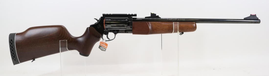 Taurus/Braztech Circuit Judge Double Action Revolving Rifle: 45LC/410ga. 18 1/2" bbl, SN AEB065443. 99% blue finish shows only a faint cylinder drag line, very good rifled bore, fiber optic sights, Weaver style scope mount, wood stock and forearm show only very