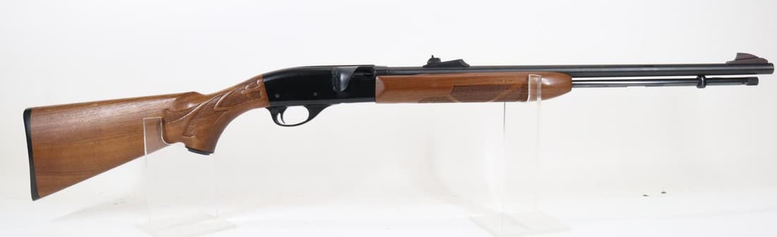 Remington Model 552 Speedmaster Semi Automatic Rifle: 22S,L,LR, 21 1/2" bbl, SN A1998924. 90% blue finish shows average handling with scratches on top and left side of receiver and thinning on crisp edges, good bore, checkered wood stock and forearm show