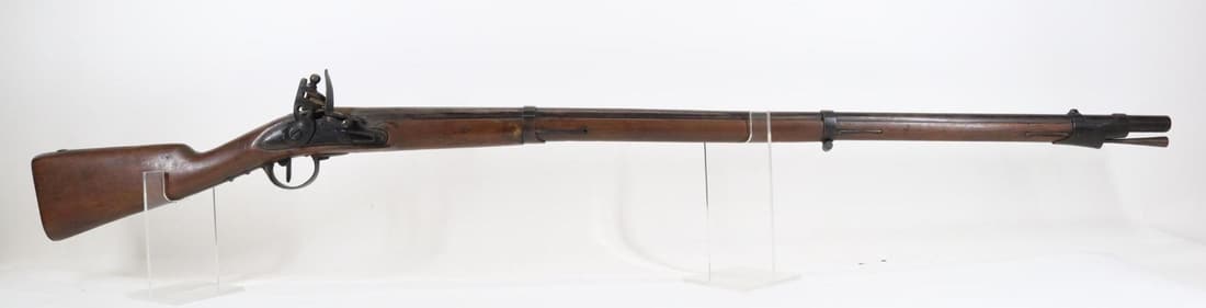 French Charleville Style Napoleonic Era Flintlock Musket: .706 bore, 41 1/8" bbl, NSN. Dark brown/gray patina, poor bore, no visible markings on barrel, strong lock holds on half and full cock with lock plate being only marked with a crown over M proof, peri