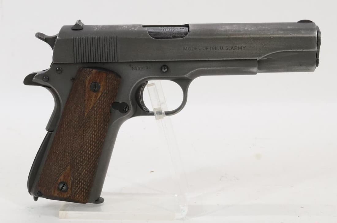Colt 1911 US Army Semi Automatic Pistol: 45ACP, 5" bbl, SN 59909. Light gray patina with blue mag release, take down lever, safety lock and plug, left side of frame marked UNITED STATES PROPERTY with no visible inspector marks, top of frame