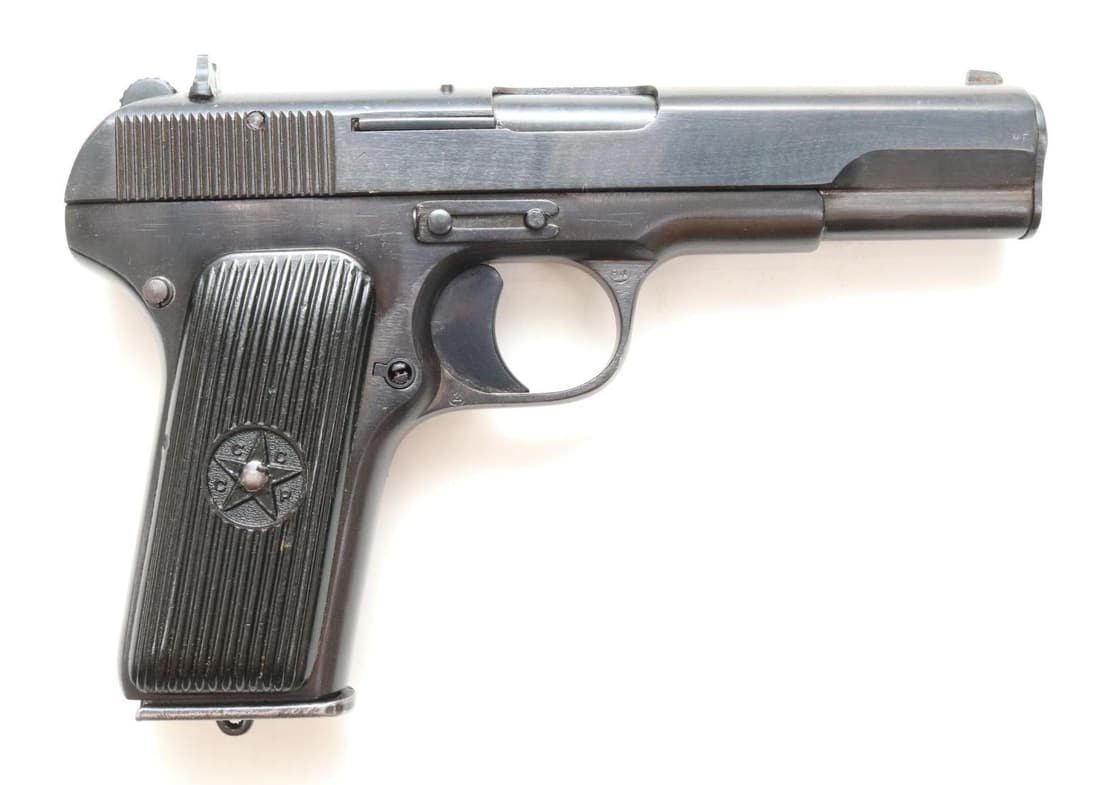 Russian Tula/CAI Tokarev TT Semi Automatic Pistol: 7.62x25, 4 1/2" bbl, SN PV1288, 98% blue finish shows light handling with a few scattered light freckles, good bore, left side of frame marked with a dotted triangle in circle and dated 1952, matching