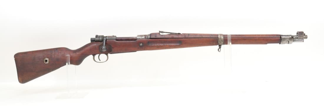 Polish P.F.K WASZAKA K98 Bolt Action Rifle: 7.92mm, 23 3/4" bbl, SN 57587. Silver gray patina, good bore, receiver ring dated 1926 with eagle crest, non matching numbers, wood stock and handguards show moderate/heavy handling with several crack