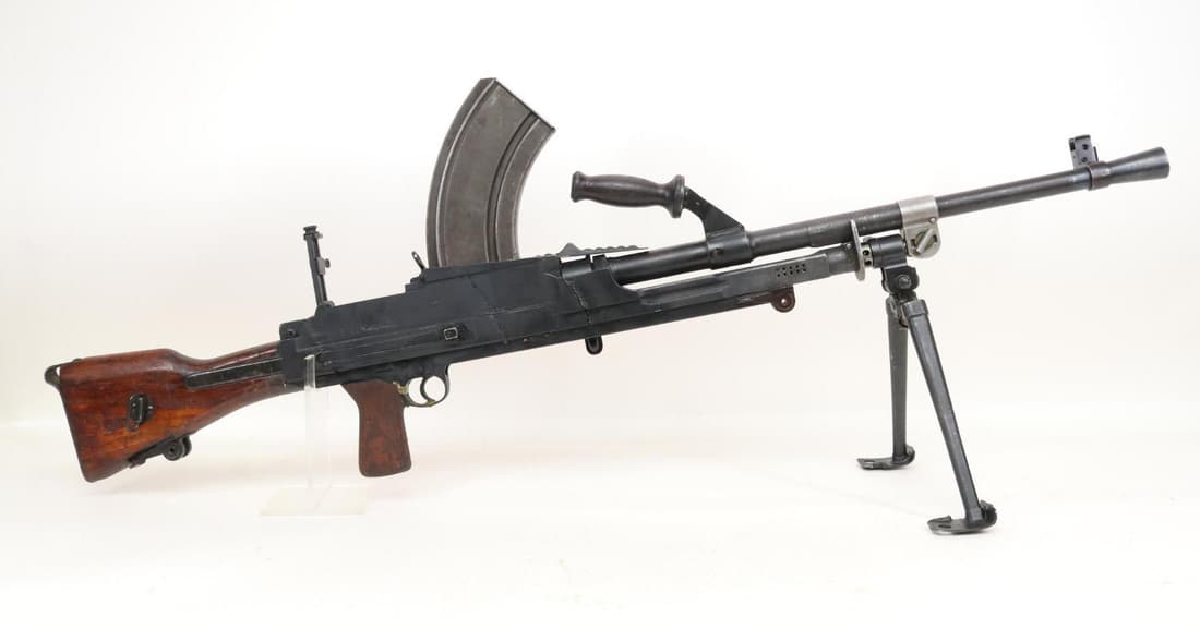 Inglis Bren MKII MG Parts Kit Dummy/Replica: approx 46 1/2" over all, Bren MKII assembled from a demilled parts kit with epoxy and metal pieces (1 seam is not attached see photos), bolt/charging handle, trigger and selector switch are fixed and