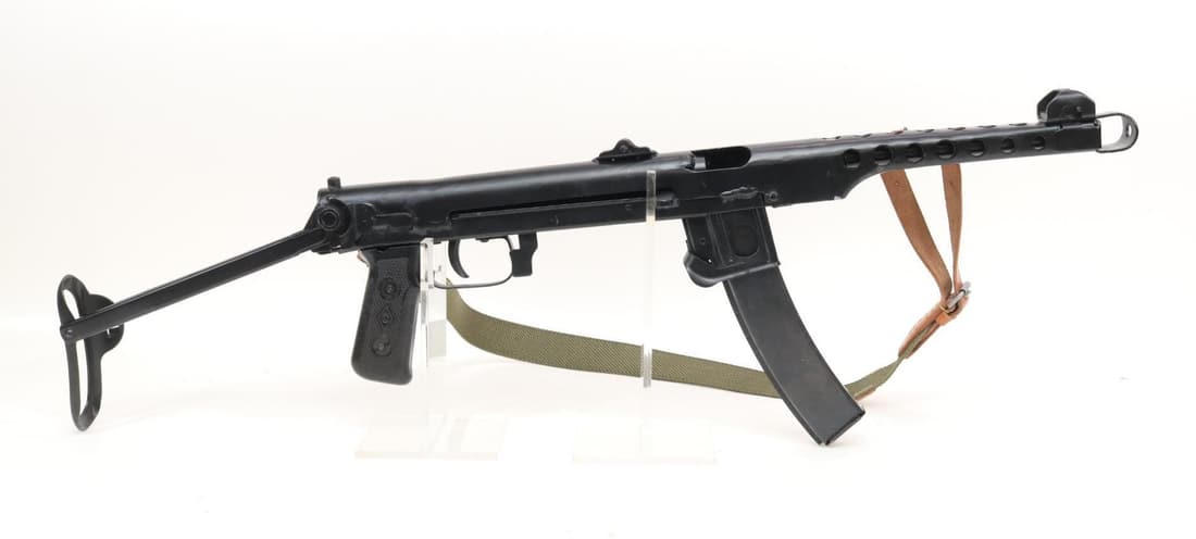 Soviet PPS-43 Dummy/Replica SMG: approx 32 1/4" over all with stock open, Commercially made as a Non gun to replicate a PPS-43 bolt is fixed and cannot be moved, dummy barrel, folding stock, canvas sling and 1 high capacity magazine.