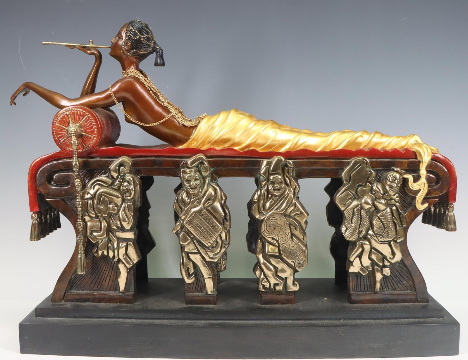 Romain (Erte) De Tirtoff (1892 - 1990): Cold painted, parcel gilt and silvered bronze sculpture, "Daydreams", from Chalk and Vermillion and Sevenarts, impressed signature and artist's cipher to the front of the daybed, dated 1989, and numbe