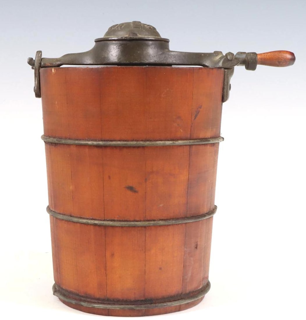White Mountain Junior Ice Cream Maker: White Mountain Junior ice cream maker, one pint, tapered cedar bucket, soldered steel bands, includes hand crank and interior crank system, steel and wood. 8.25”h x 7.5”w