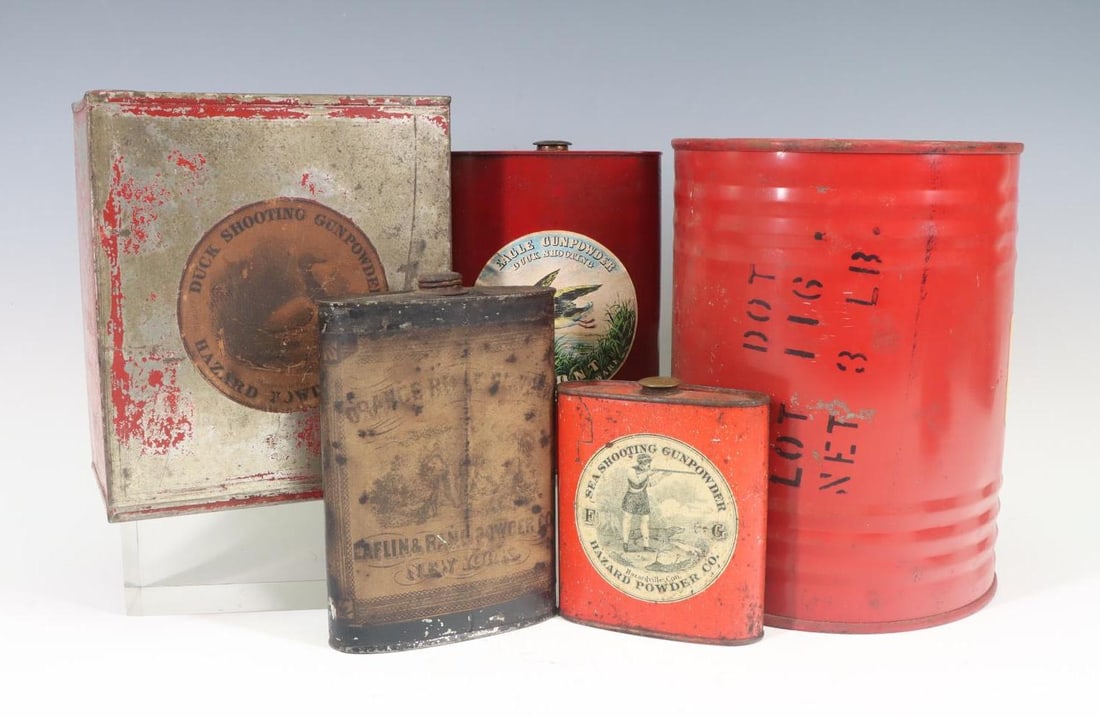 Black Powder Cans: Collection of black powder cans including Sea Shooting, Hazard duck shooting, Laflin and Rand, Dupont, and Hercules. Largest 8"h x 6.25"w