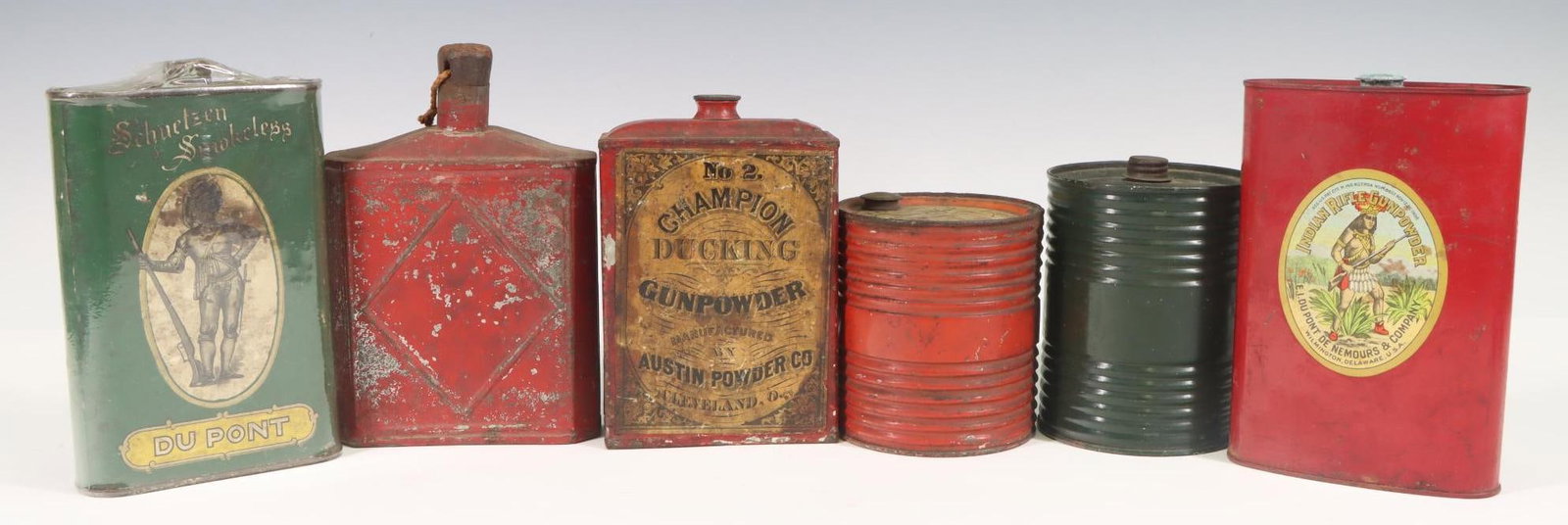 Black Powder Cans: Collection of black powder cans including Dupont, Austin Powder Co., etc. Largest 6"h